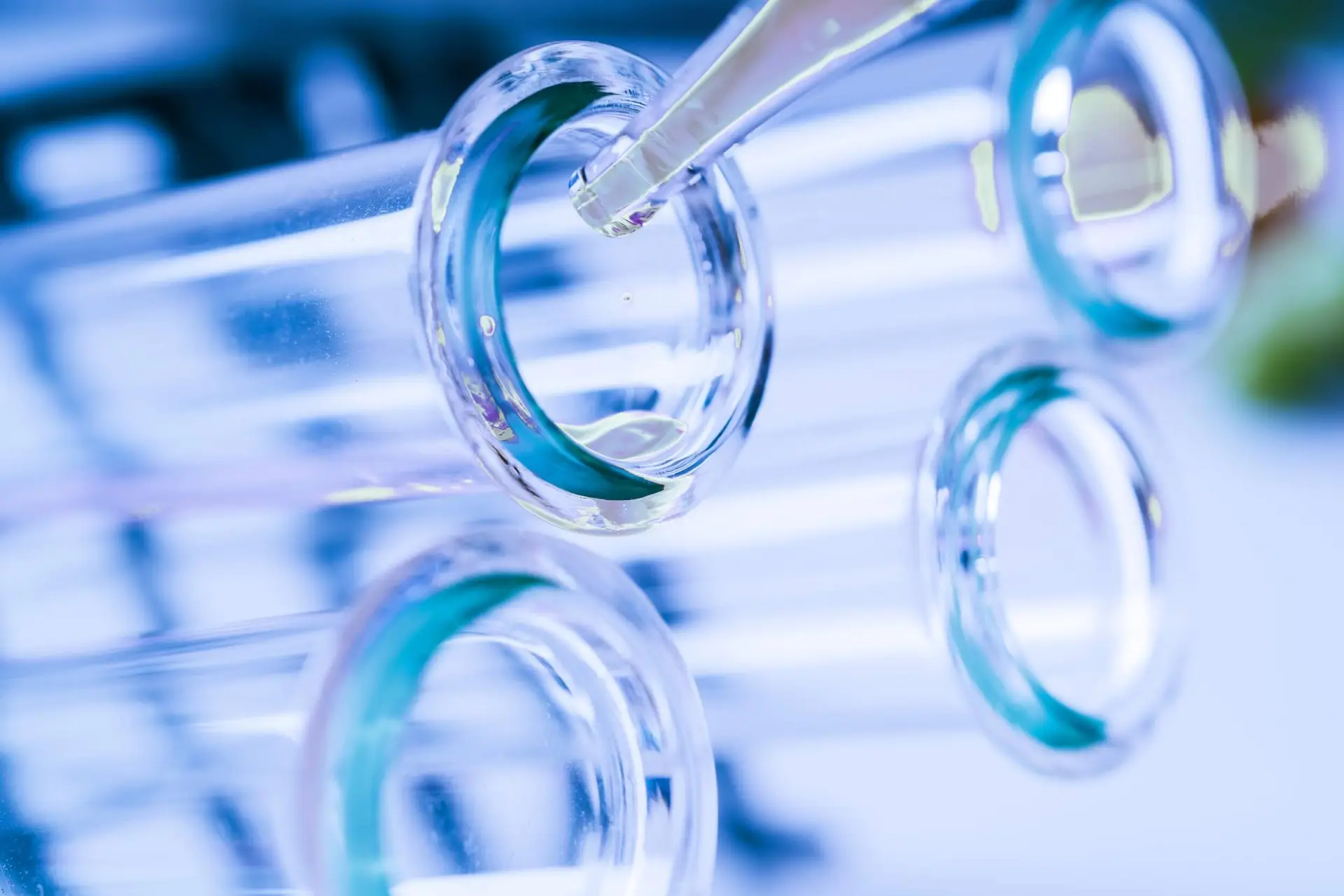 Close-up of test tubes and pipette. Resolian Bioanalytics and Analytical Sciences.